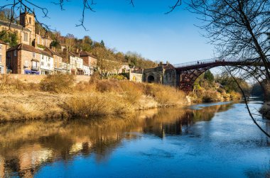 The historic Ironbridge over the River Severn in the town of Ironbridge, Shropshire, UK