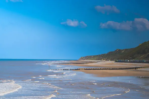 A view of Cromer Beach looking towards Overstrand in North Norfolk, UK