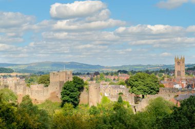 Ludlow town in Shropshire, UK on a Summer day from an elevated position with Castle and Church