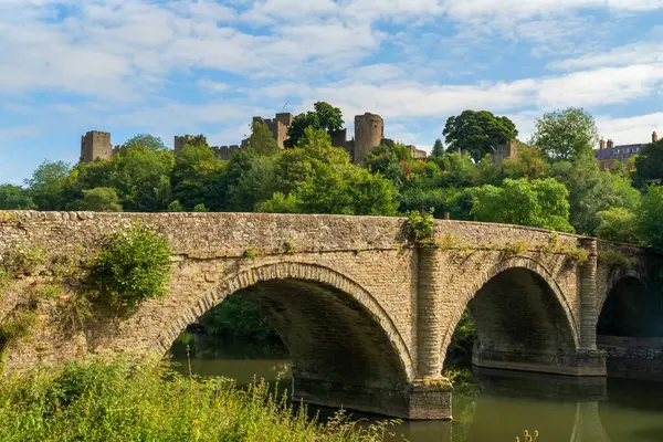 stock image Dinham bridge over the River Teme with Ludlow castle behind in the town of Ludlow, Shropshire UK in Landscape orientation