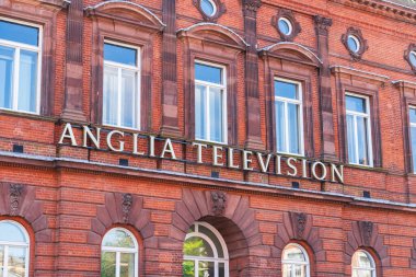 Norwich, UK - August 30 2024: Anglia Television Head Office with company logotype, Regional UK ITV Office clipart