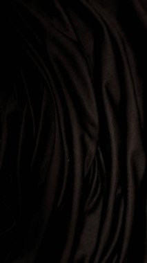 Dalgalı siyah ipek kumaş. Kumaşın arkaplanı.