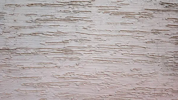 Eski duvarın dokusu beyaz boyayla kaplıydı. Soyulmuş boyalı bir duvarın arkaplan resmi