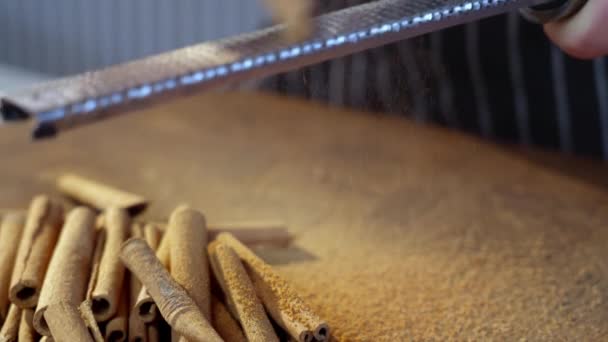 Grating Cinnamon Sticks Sticks Powdered Cinnamon Spice Slow Motion Video — Stok video