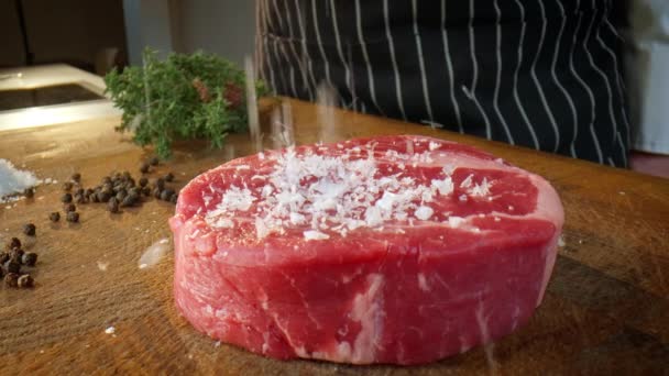 Chef Cooks Beef Steak Sprinkling Salt Food Preparation High Quality — Vídeo de Stock