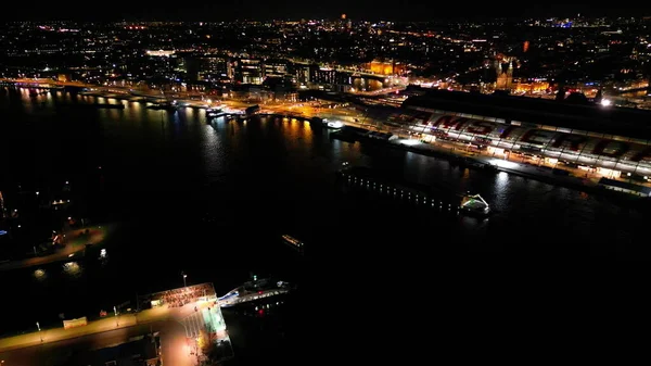 Amsterdam by night aerial drone view