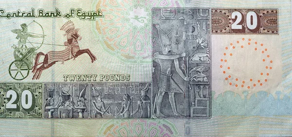 Egpの逆側の大きな断片20エジプトポンド紙幣 エジプトシリーズの通貨2022特徴セヌスレットの礼拝堂からのファラオの戦争の戦車とフリーズ私 — ストック写真