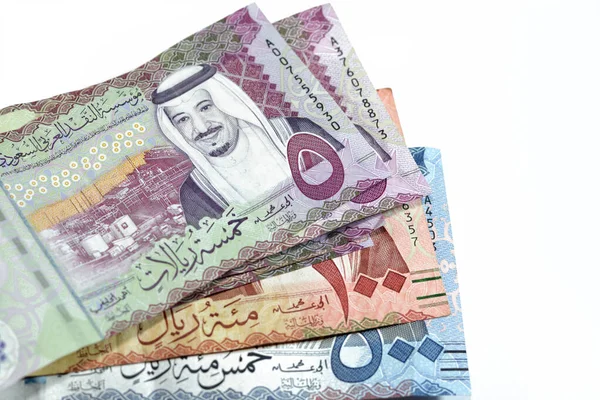 stock image 500 SAR Five hundred Saudi Arabia riyals cash money with king AbdulAziz Al Saud and Kabaa and 100 SAR one hundred Saudi Arabia riyals banknote with king Salman and 5 SAR Saudi riyals note