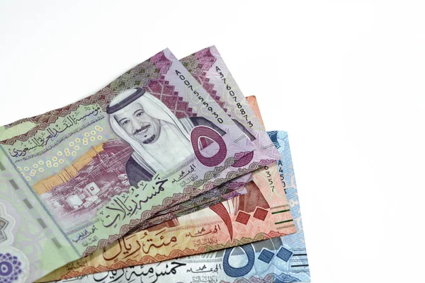 stock image 500 SAR Five hundred Saudi Arabia riyals cash money with king AbdulAziz Al Saud and Kabaa and 100 SAR one hundred Saudi Arabia riyals banknote with king Salman and 5 SAR Saudi riyals note