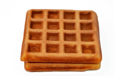 Waffle, iki tabak arasında pişirilen ve karakteristik bir şekil, şekil ve yüzey izi veren mayalanmış hamur ya da hamurdan yapılan bir yemektir.