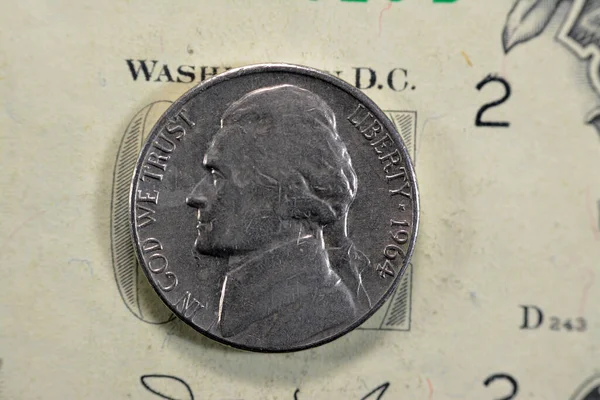 Obverse side of American money coin of 5 five cents 1964 features the profile of Thomas Jefferson the founding father and 3rd president of the United States of America, old USA vintage retro coin