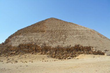 The Bent Pyramid of king Sneferu, A unique example of early pyramid development in Egypt located at Dahshur Badrashin Badrshein city, made of ancient limestone, height 104 meters, base 189 meters