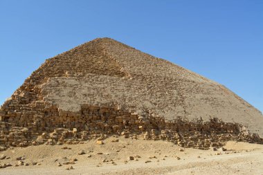The Bent Pyramid of king Sneferu, A unique example of early pyramid development in Egypt located at Dahshur Badrashin Badrshein city, made of ancient limestone, height 104 meters, base 189 meters