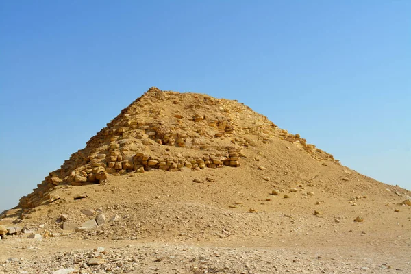 The satellite pyramid located 55 meters south to the bent pyramid of king Sneferu, 26 meters in height and 52.80 meters in length, it is made of limestone, vintage retro ancient Egyptian monument