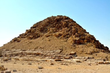 The satellite pyramid located 55 meters south to the bent pyramid of king Sneferu, 26 meters in height and 52.80 meters in length, it is made of limestone, vintage retro ancient Egyptian monument