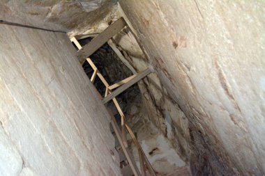 Giza, Egypt, January 26 2023: Details of the interior passages of The Bent Pyramid of king Sneferu, A unique example of early pyramid development in Egypt, madse of ancient limestone, selective focus