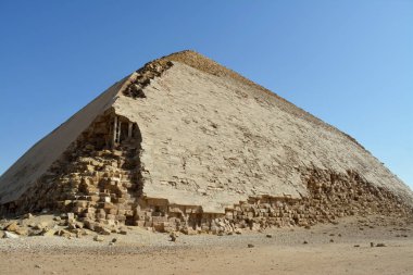 The Bent Pyramid of king Sneferu, A unique example of early pyramid development in Egypt located at Dahshur Badrashin Badrshein city, made of ancient limestone, height 104 meters, base 189 meters