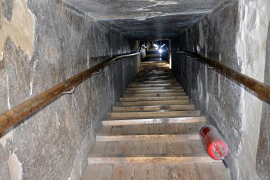 Giza, Egypt, January 26 2023: Details of the interior passages of The Bent Pyramid of king Sneferu, A unique example of early pyramid development in Egypt, madse of ancient limestone, selective focus