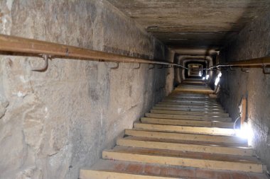 Giza, Egypt, January 26 2023: Details of the interior passages of The Bent Pyramid of king Sneferu, A unique example of early pyramid development in Egypt, madse of ancient limestone, selective focus