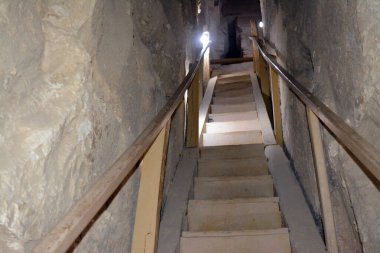 Giza, Egypt, January 26 2023: Details of the interior passages of The Bent Pyramid of king Sneferu, A unique example of early pyramid development in Egypt, madse of ancient limestone, selective focus