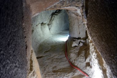 Giza, Egypt, January 26 2023: Details of the interior passages of The Bent Pyramid of king Sneferu, A unique example of early pyramid development in Egypt, madse of ancient limestone, selective focus