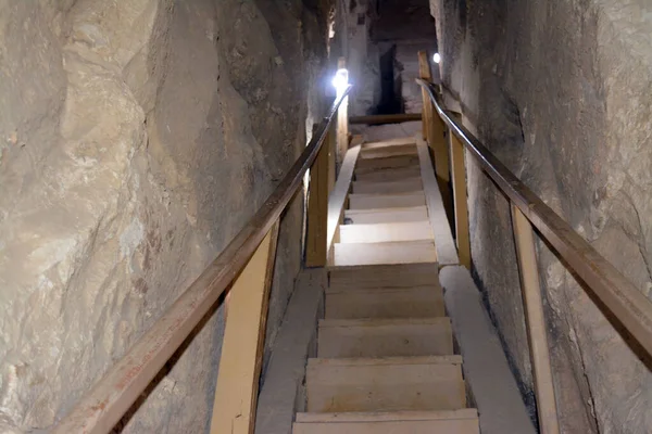Giza, Egypt, January 26 2023: Details of the interior passages of The Bent Pyramid of king Sneferu, A unique example of early pyramid development in Egypt, madse of ancient limestone, selective focus