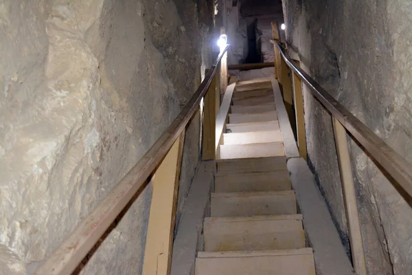 Giza, Egypt, January 26 2023: Details of the interior passages of The Bent Pyramid of king Sneferu, A unique example of early pyramid development in Egypt, madse of ancient limestone, selective focus