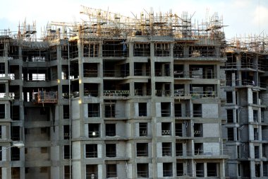 Giza, Egypt, February 4 2023: A construction site of new high rise in Egypt by Orascom construction Zed city Sheikh Zayed, new real estate Egyptian projects and new residential towers, selective focus