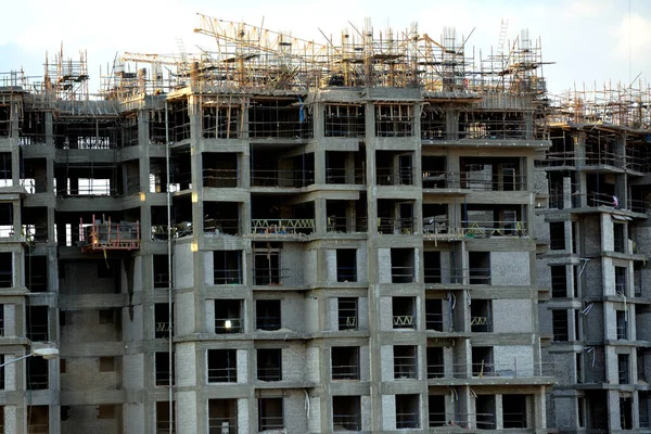 Giza, Egypt, February 4 2023: A construction site of new high rise in Egypt by Orascom construction Zed city Sheikh Zayed, new real estate Egyptian projects and new residential towers, selective focus