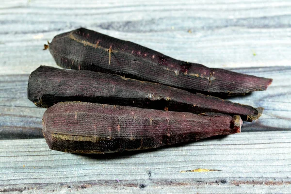 Black carrots, The carrot (Daucus carota subsp. sativus) is a root vegetable, typically orange in color, a biennial plant in the umbellifer family, Apiaceae. At first, it grows a rosette