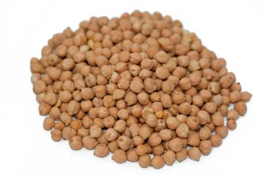 The chickpea or chick pea (Cicer arietinum),  an annual legume of the family Fabaceae, subfamily Faboideae, variously known as gram or Bengal gram or garbanzo bean or Egyptian peas, selective focus