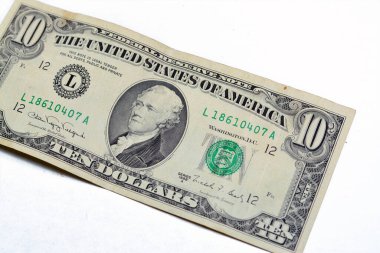 obverse side of old 10 $ ten American dollars bill banknote series 1988 features the portrait of Alexander Hamilton, who served as the first U.S. Secretary of the Treasury isolated on white background