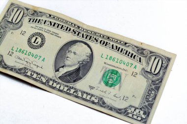 obverse side of old 10 $ ten American dollars bill banknote series 1988 features the portrait of Alexander Hamilton, who served as the first U.S. Secretary of the Treasury isolated on white background
