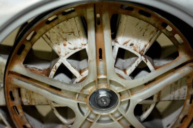 Rusty old dirty automatic electric washing machine drum that is connected to the machine motor engine, washing machine maintenance, fixing machine and replacement concept, selective focus