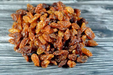 Dried Egyptian Raisins Ramadan dried fruits Yameesh, dried dates that is used in Ramadan Khoshaf or compote that the fasting Muslims start their breakfast on it, selective focus of Ramadan background