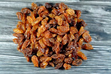Dried Egyptian Raisins Ramadan dried fruits Yameesh, dried dates that is used in Ramadan Khoshaf or compote that the fasting Muslims start their breakfast on it, selective focus of Ramadan background