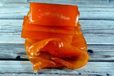 Dried apricot paste that is used in Ramadan Khoshaf or compote with dried dates fruit that Muslims start their breakfast in Ramadan on it, selective focus of Ramadan background