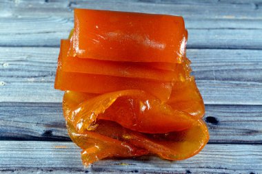 Dried apricot paste that is used in Ramadan Khoshaf or compote with dried dates fruit that Muslims start their breakfast in Ramadan on it, selective focus of Ramadan background