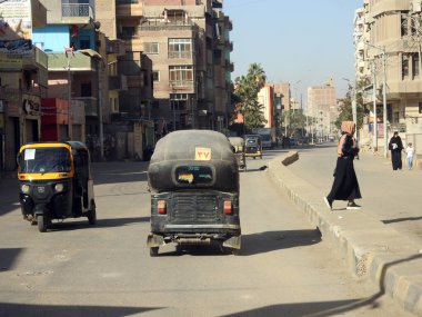 Giza, Egypt, January 26 2023: auto rickshaw, baby taxi, mototaxi, pigeon, jonnybee, bajaj, chand gari, lapa, tuk-tuk, tum-tum, Keke-napep, Maruwa, 3wheel, pragya, bao-bao, easy bike, cng and tukxi