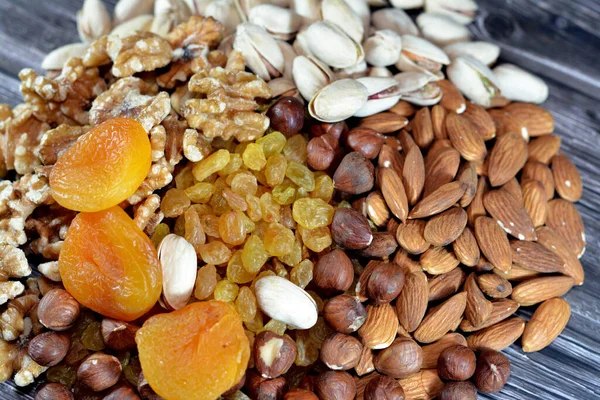 Mixture of various types of nuts, Pistachios, hazelnuts, almonds, walnuts, raisins, dried apricot, used in baking and desserts and could be eaten raw, contain vitamins and minerals and used in Ramadan