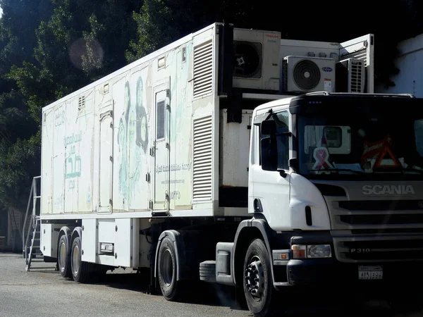 stock image Cairo, Egypt, March 16 2023: The mobile unit for Egyptian women health with a mamogram device for early detection of breast cancer, 100 million health initiative campaign, WHO, ministry of health