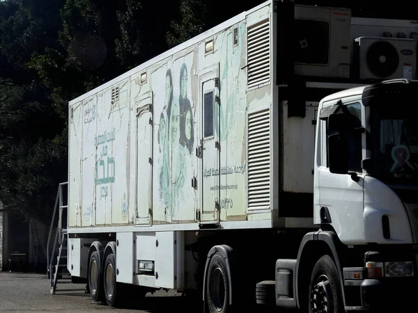 stock image Cairo, Egypt, March 16 2023: The mobile unit for Egyptian women health with a mamogram device for early detection of breast cancer, 100 million health initiative campaign, WHO, ministry of health