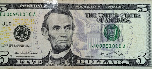 破れた5ドル紙幣の紙幣の反対側の大きな断片は エイブラハム リンカーン大統領の肖像画 古いアメリカのお金の紙幣 ヴィンテージレトロと接着剤石膏で修復されました — ストック写真