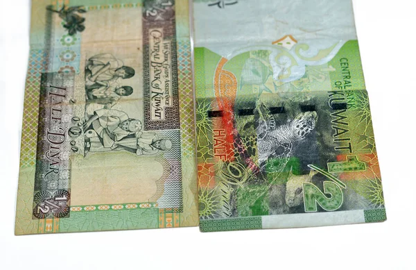 旧的和新的科威特半第纳尔钞票钞票上印有科威特国徽的货币外套 零钱小摊 咖啡壶 科威特塔和一艘独桅帆船 玩弹珠的男孩 — 图库照片