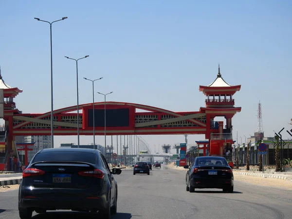 stock image Cairo, Egypt, April 16 2023: Shinzo Abe axis patrol highway in Egypt with a pedestrian bridge finished in traditional Japanese architectural style, the traffic highway is named on former Japanese PM