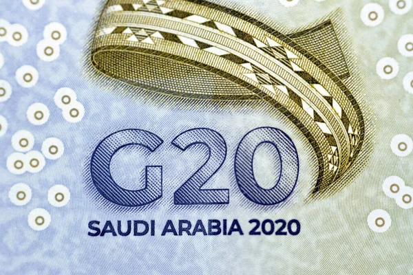 3D logo of the Kingdom\'s Presidency of G20 summit in 2020 AD 1442 AH from Obverse side of 20 SAR twenty Saudi Arabia Riyals banknote currency bill money Commemorative issue with king Salman portrait