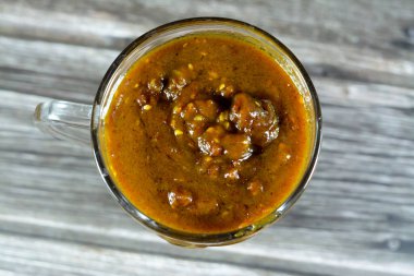 Mısırlı Moghat yoğun içeceği hamilelik ve doğumdan sonra popüler, Glossostemon bruguieri, geleneksel tıpta birçok besin ve tıbbi değer için kullanılan soyulmuş kökler, seçici odaklanma