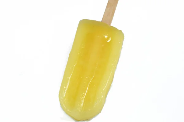 Pineapple Frozen ice cream stick, a creamy and delicious frozen dessert, concept of confectionary summer times, frozen snack treat of ice-cream, selective focus of fruit iced creamy treat