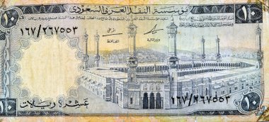 10 SAR Suudi Arabistan yandaşının büyük bir bölümünün nakit para birimi banknotu El-Mescid el-Haram (Kutsal Cami), Mekke, antika eski 10 riyal, seçici odak noktası