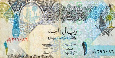 Katar Riyal nakit para birimi Katar banknotunun 1 Katarlı Riyal tarafının büyük bir parçası Ornated sütun, kemerler, yelkenli, palmiye ağaçları, çapraz kılıçlar, antika eski Katar faturası